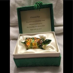 A glass Messenger Friendship turtle
